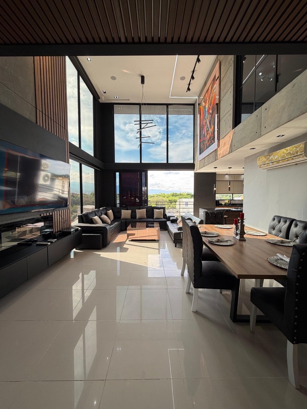 Penthouse Acqualina con doble altura, zona social y vista panorámica